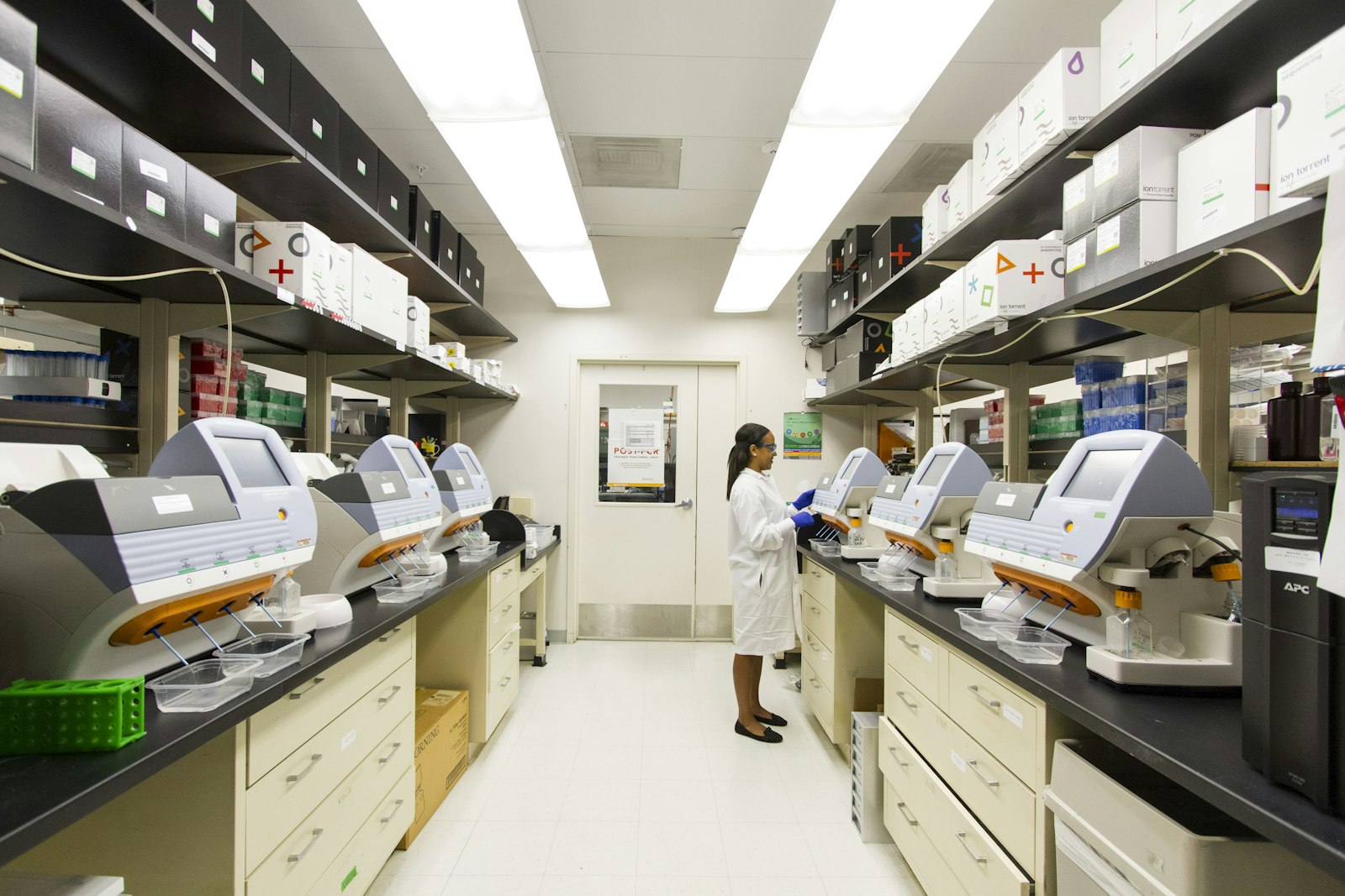 Laboratory technologists processing samples in the hospital pathology laboratory