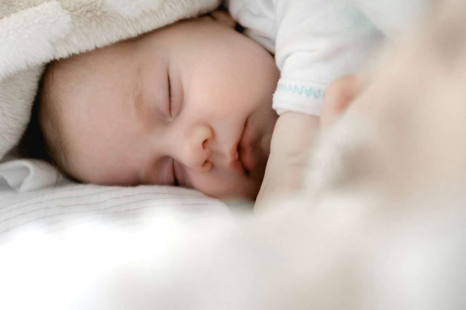 A newborn resting in the maternity unit at Medora Care Hospital